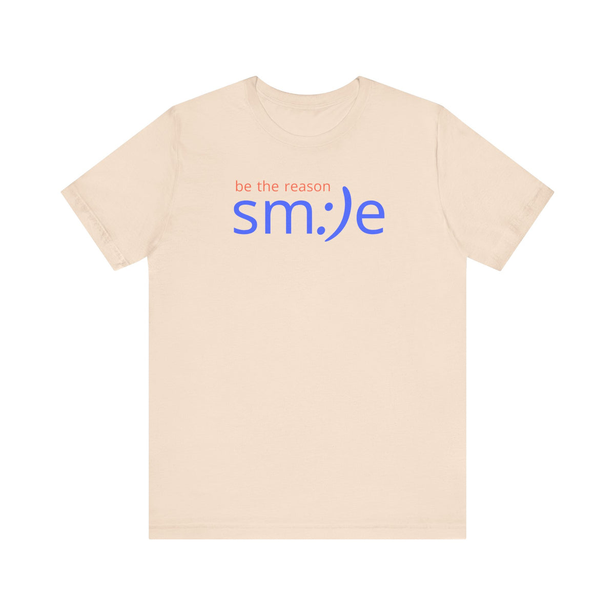 Beige t-shirt with 'be the reason smile' text on a white background