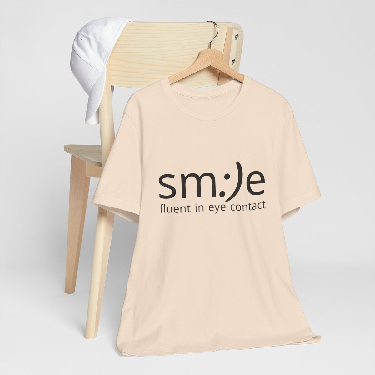 Unisex Jersey Short Sleeve Tee | sm:)e Fluent in Eye Contact | Confidence Streetwear