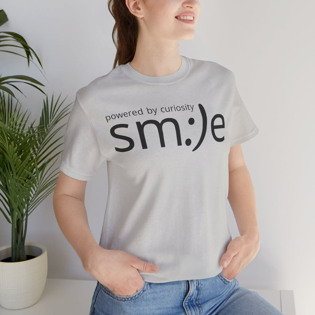 sm:)e Powered by Curiosity T-Shirt | Inspirational Unisex Graphic Tee