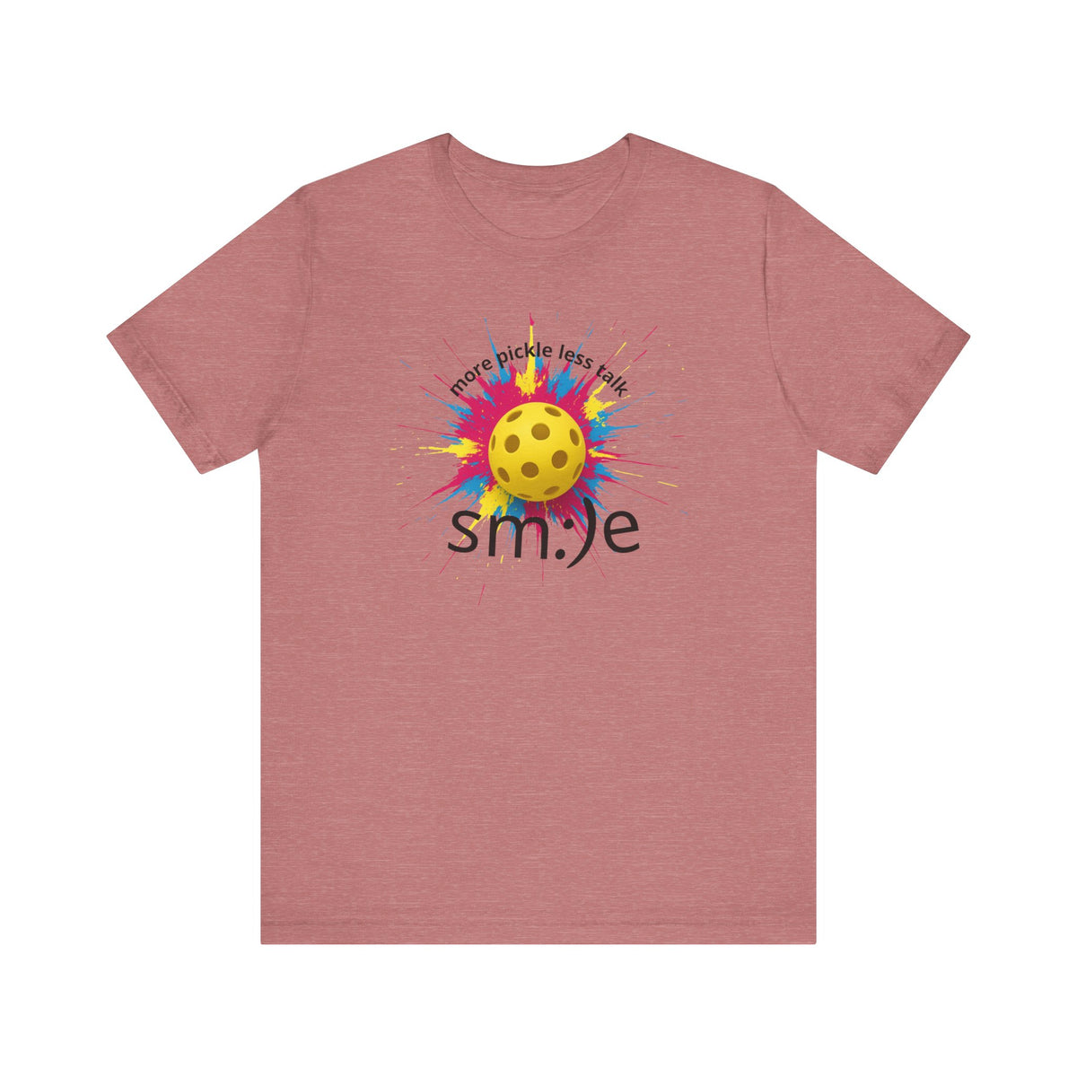 Pink t-shirt with a colorful pickleball design and 'smile' text on a white background