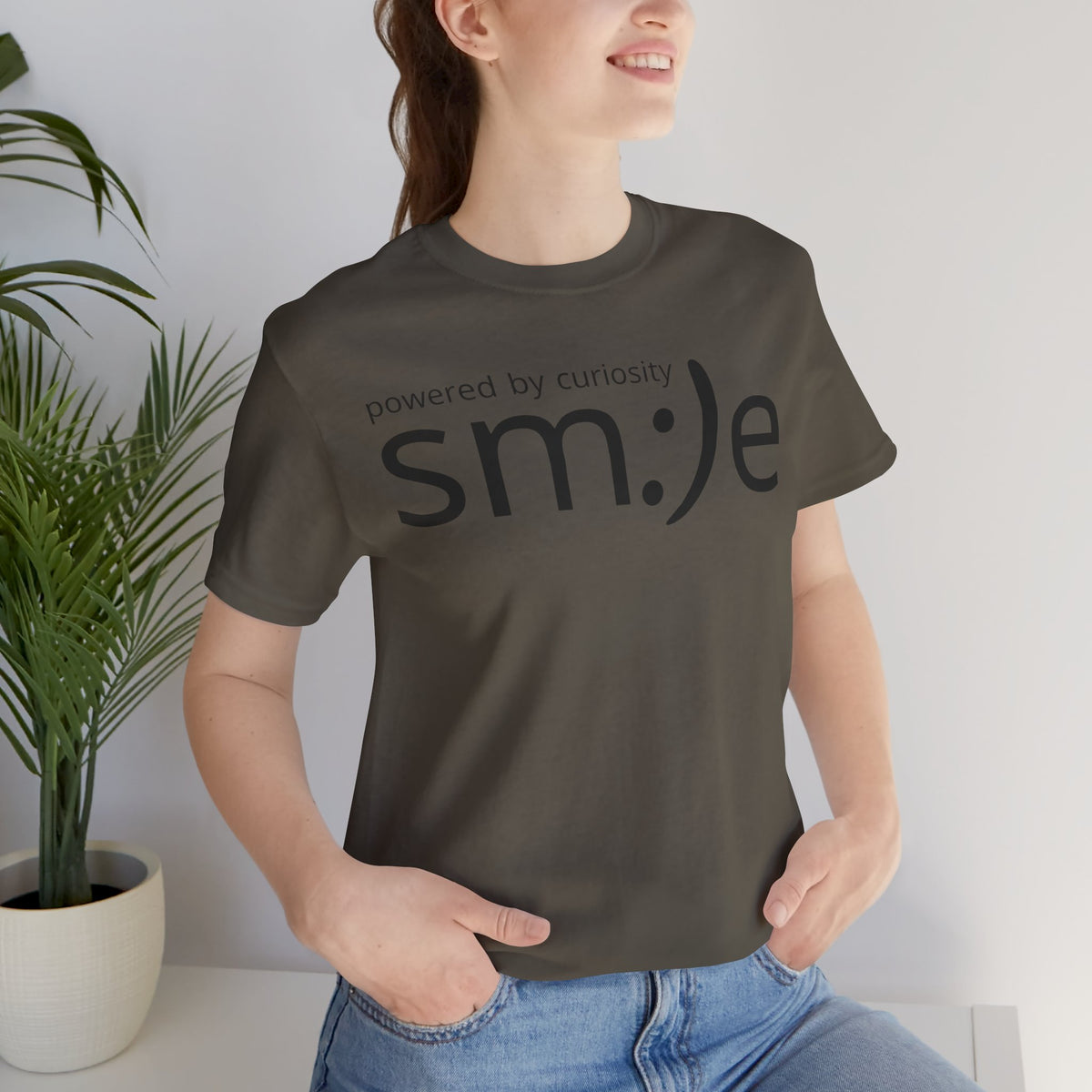 sm:)e Powered by Curiosity T-Shirt | Inspirational Unisex Graphic Tee
